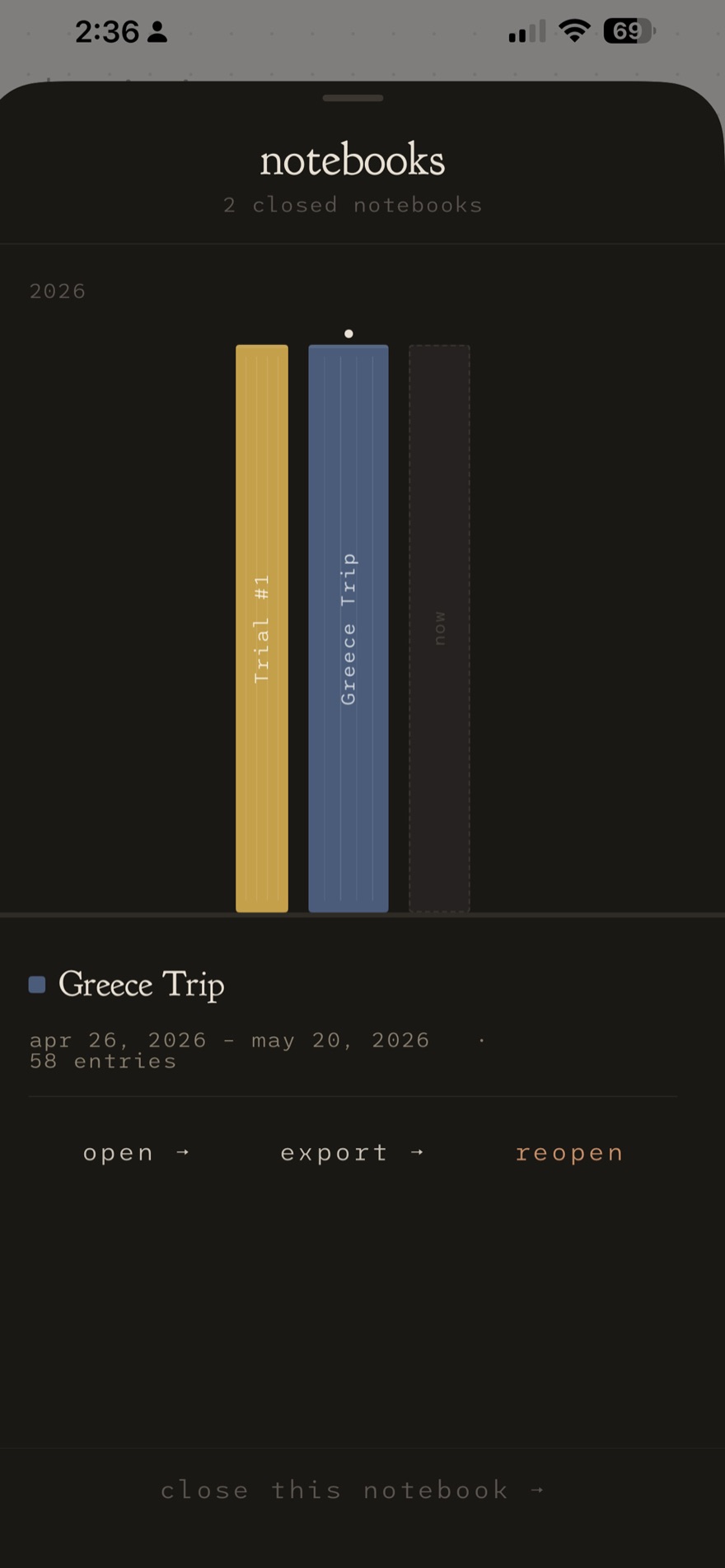 The Decisions notebook archive — closed notebooks as tall colored spines on a dark shelf.